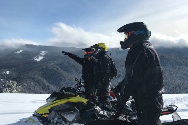Taylor Fork snowmobile trail montana riders out on the trail looking out to options