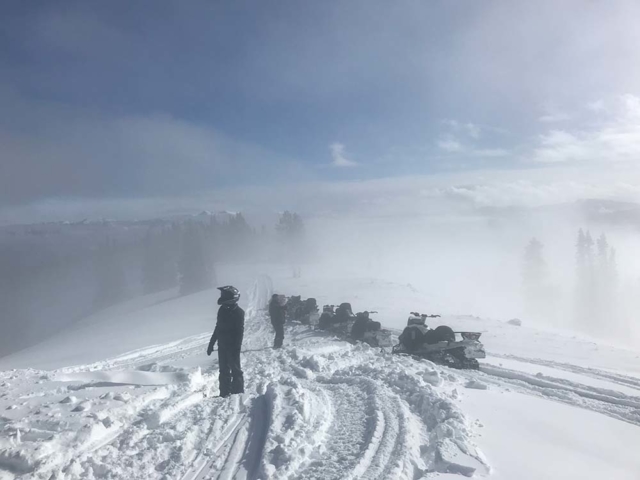foggy trail snowmobiling in montana