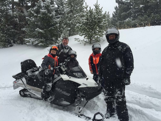 stuck in powder snowmobiling in montana