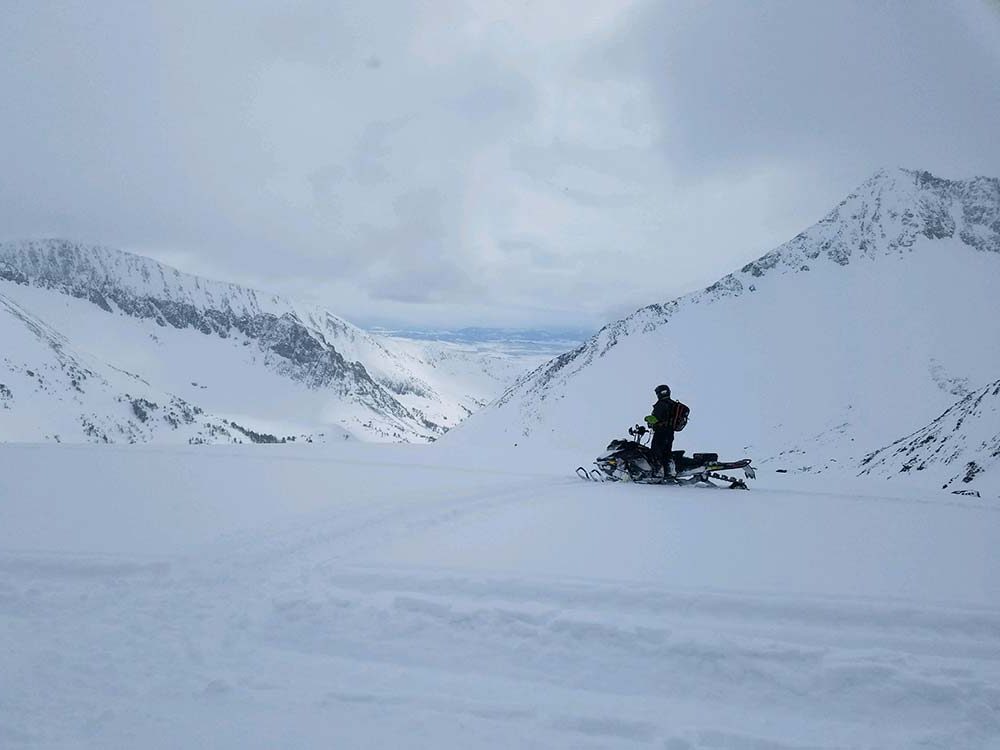 lone snowmobile trail riding in montana snow