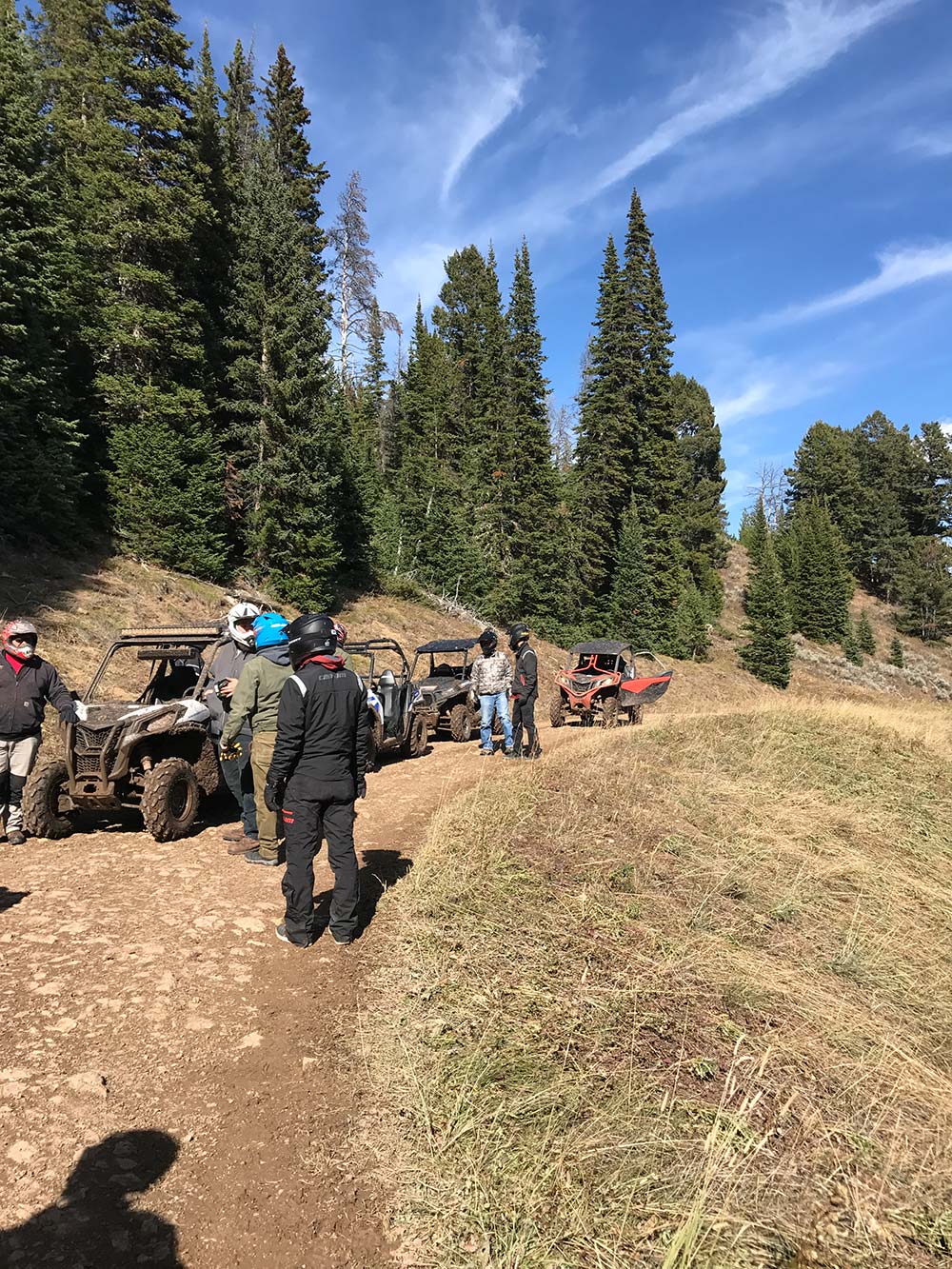 convoy of side by sides trail riding in montana